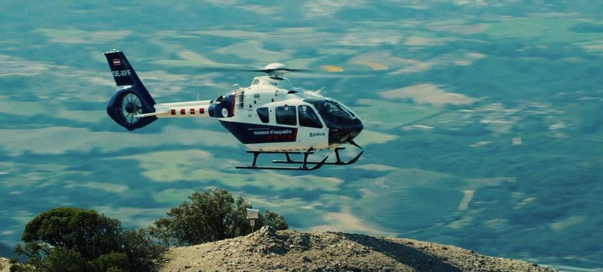 Helicòpter de la Unitat d'Intervenció a Muntanya dels Mossos d'Esquadra, que ha efectuat el rescat del cadàver
