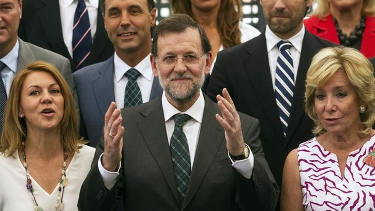 Cospedal, Rajoy y Aguirre, en la reunión de los barones del PP con la ejecutiva del partido