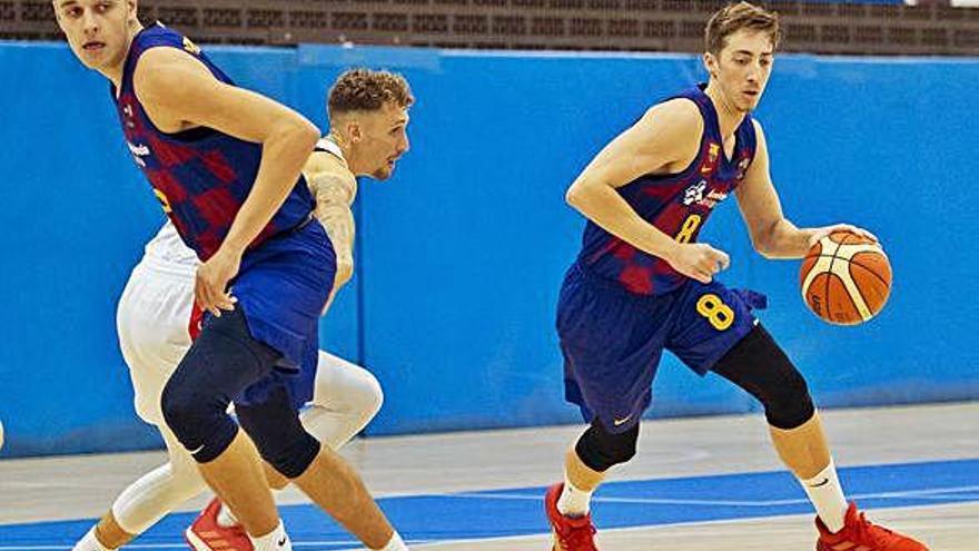 Màxim Esteban, defensant David Font en el partit d&#039;ahir.