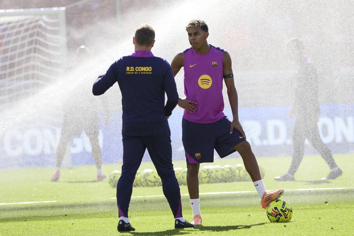 Flick y Lamine en el entrenamiento del Barça