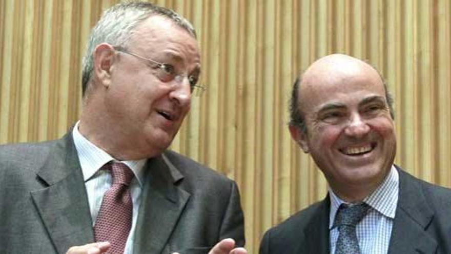 Guindos pide rapidez a Bankia a cambio del saneamiento