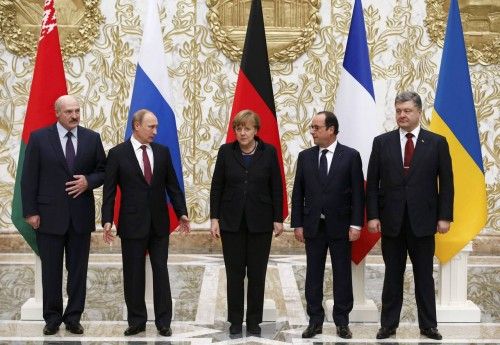 Belarus' President Lukashenko, Russia's President Putin, Ukraine's President Poroshenko, Germany's Chancellor Merkel and France's President Hollande pose for a family photo during peace talks in Minsk