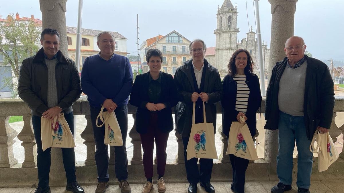 López, segundo esquerda, Fernández, terceira, e Carrero, cuarto, na xuntanza celebrada no Rosal