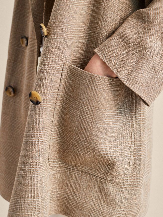 Si estas rebajas vas a invertir en un abrigo de entretiempo, hazte con este  de lino de Massimo Dutti - Woman