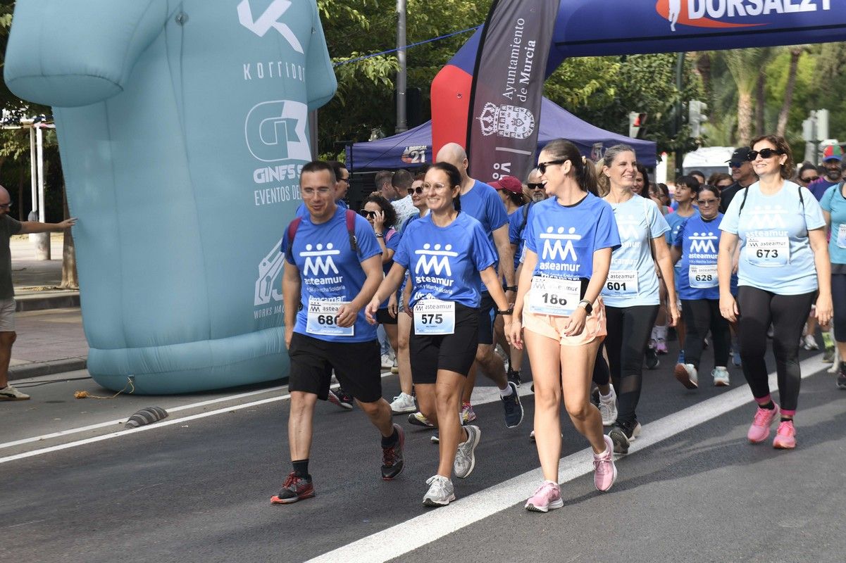 La carrera y marcha Solidaria Asteamur, en imágenes