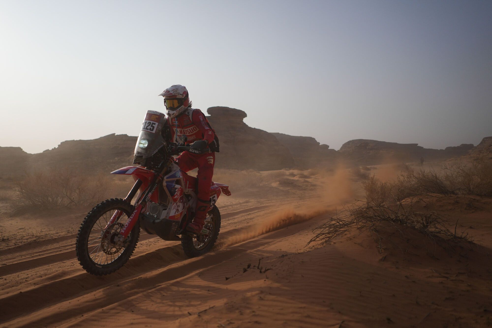Rider Shinya Fujiwara competes during the third stage of the Dakar Rally with a start and finish in Alula, Saudi Arabia, Tuesday, Jan. 6, 2026. (AP Photo/Thibault Camus)