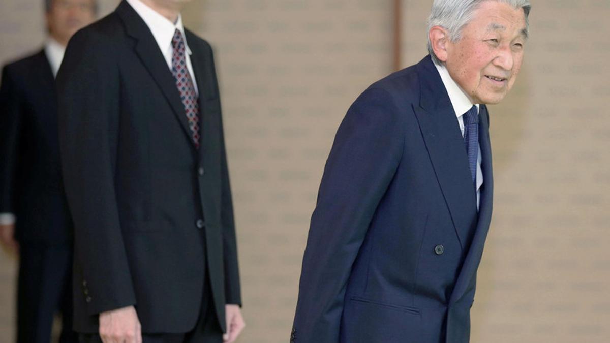 Japan's Emperor Akihito and his son Prince Akishino attend an event at Imperial Palace in Tokyo