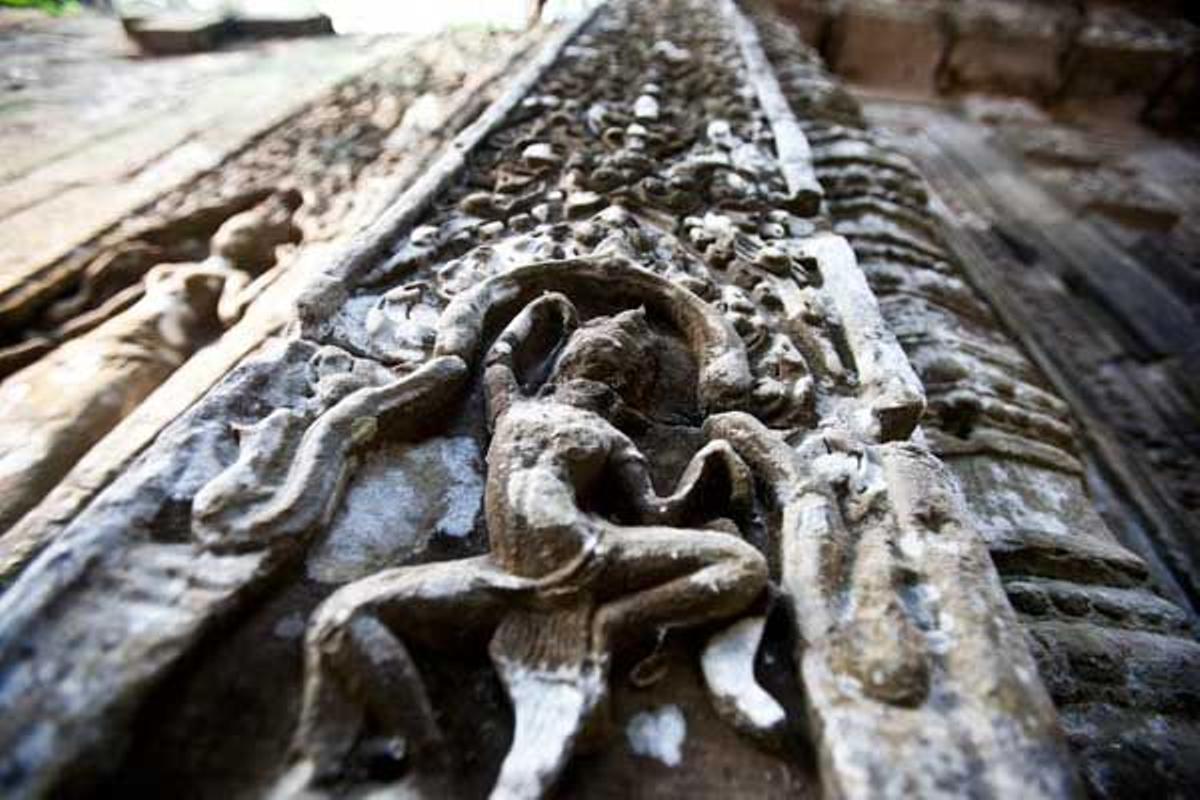 Detalle de las tallas en piedra en los muros del templo Ta Prohm.