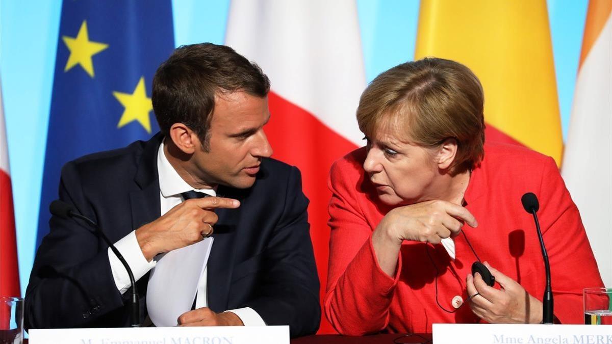 Macron y Merkel, en una reunión de la UE con líderes africanos, el 28 de agosto del 2017.