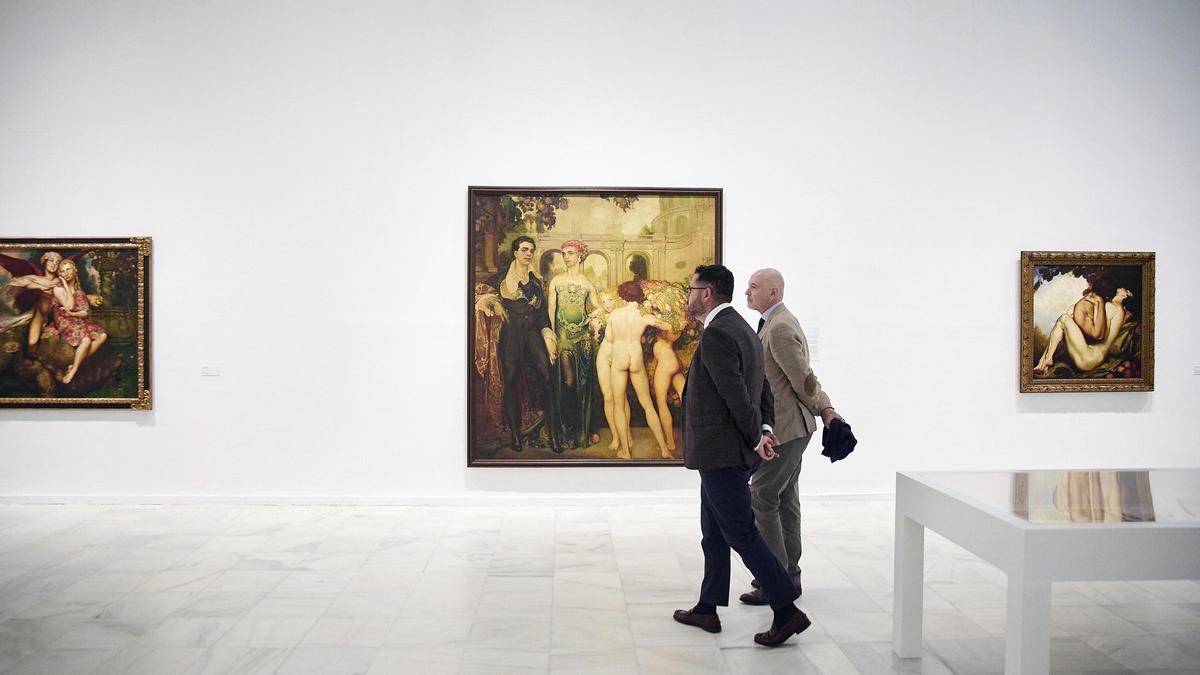 El concejal Josué Íñiguez y el director del Museo Néstor, Daniel Montesdeoca, en la exposición del Reina Sofía.