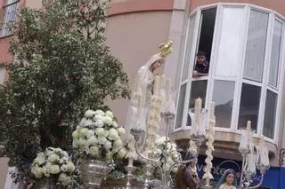 Procesión de la Virgen de Fátima por el barrio de La Trinidad, en imágenes