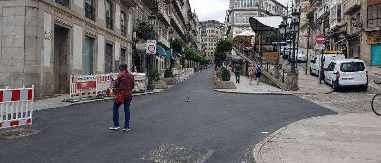 Vista de la calle Carral ya asfaltada después de que se eliminaran los adoquines // Alberto Blanco