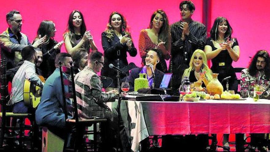 C. Tangana y amigos, durante su actuación, y el cubano Yotuel, en el centro, junto al resto de intérpretes de ‘Patria y vida’.  | // EFE