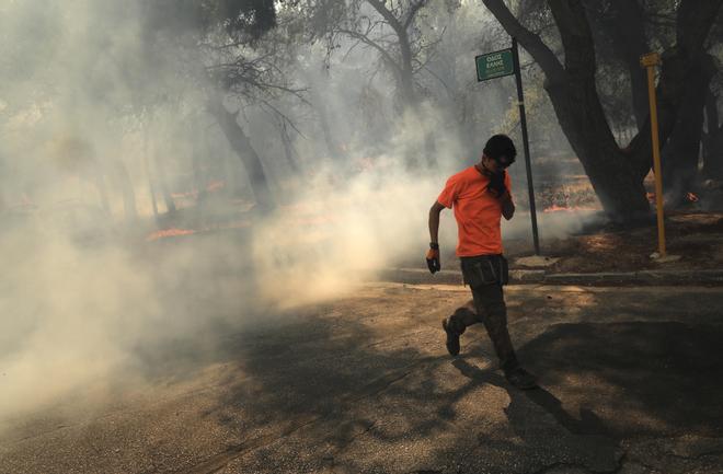 Wildfire spreads in Greeces Attica region