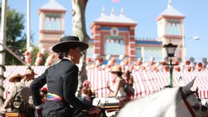 Imágenes del ambiente que se vive en el Real de la Feria de Abril en Sevilla.