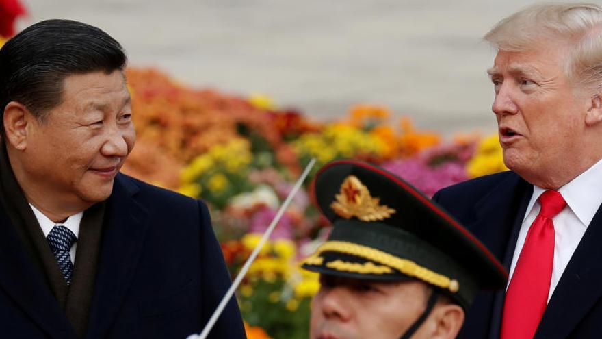 Xi Jinping, junto a Donald Trump.