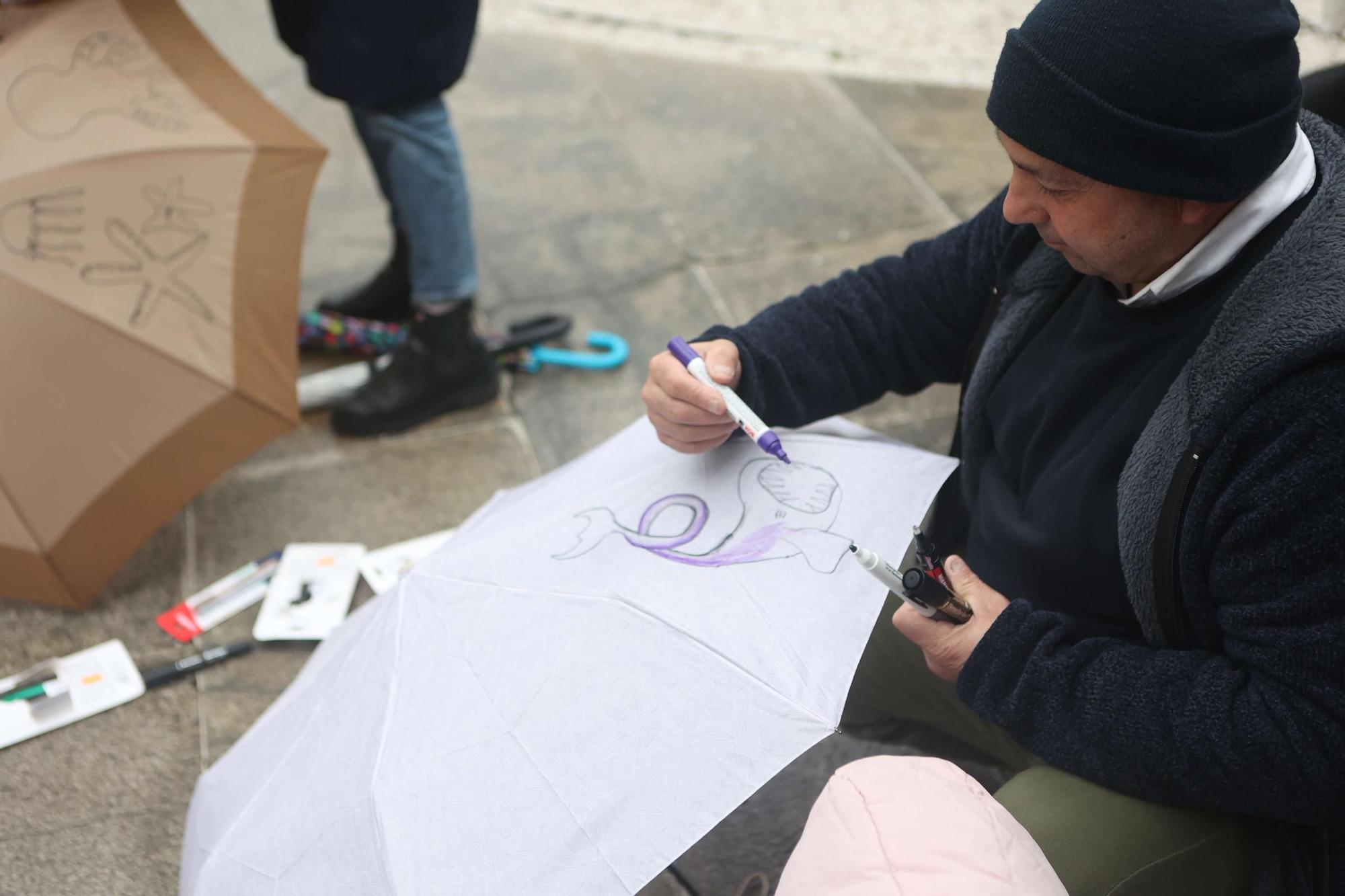 Pintada de paraguas en honor a Urbano Lugrís