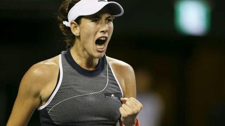 Muguruza celebra un punto en el partido de ayer.