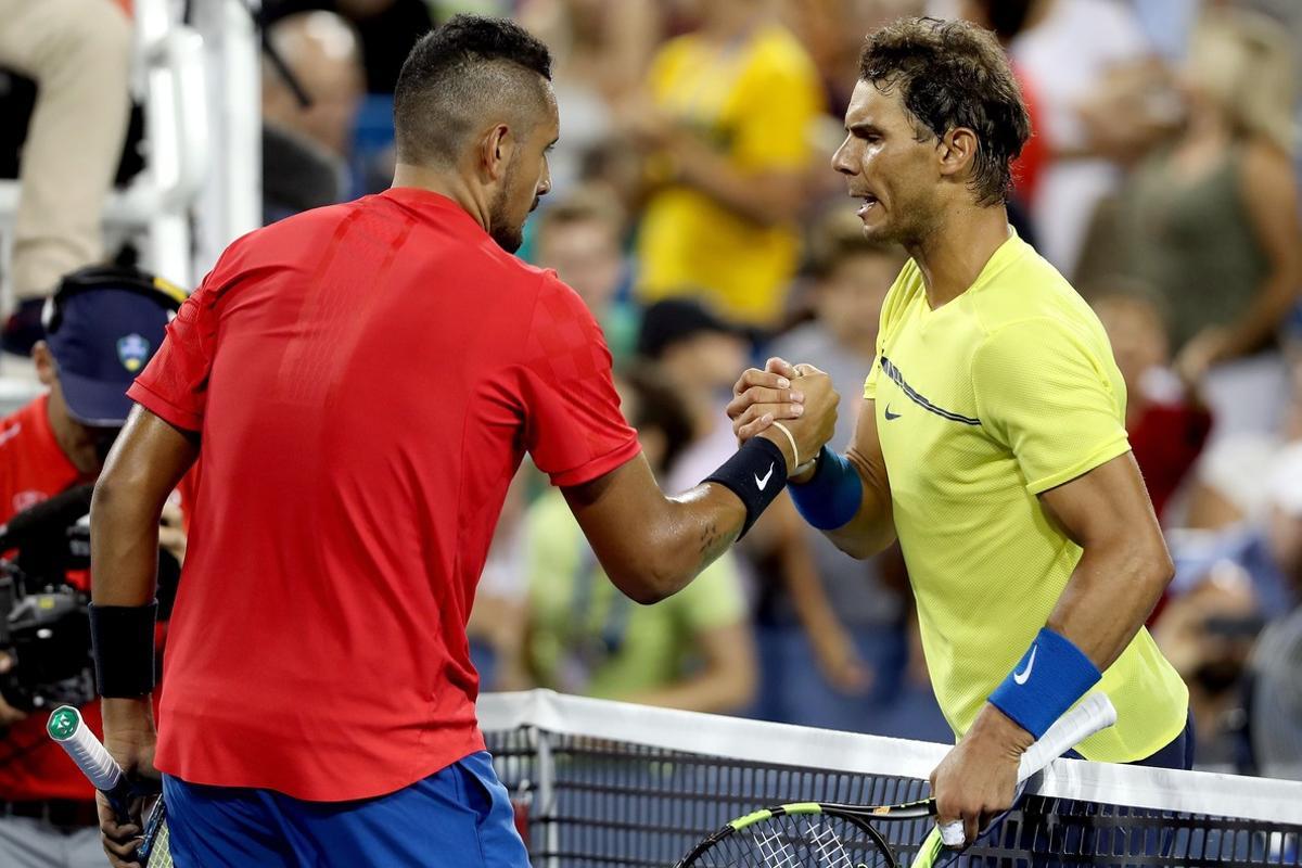 MASON, OH - AUGUST 18: Nick Kyrgios of Australia is congratulated by Rafael Nadal of Spain after their match during day 7 of the Western & Southern Open at the Lindner Family Tennis Center on August 18, 2017 in Mason, Ohio.   Matthew Stockman/Getty Images/AFP