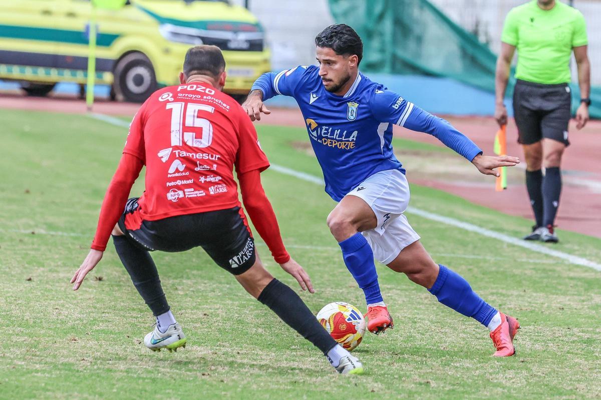 Lance del encuentro entre la UD Melilla y el Salerm Puente Genil.