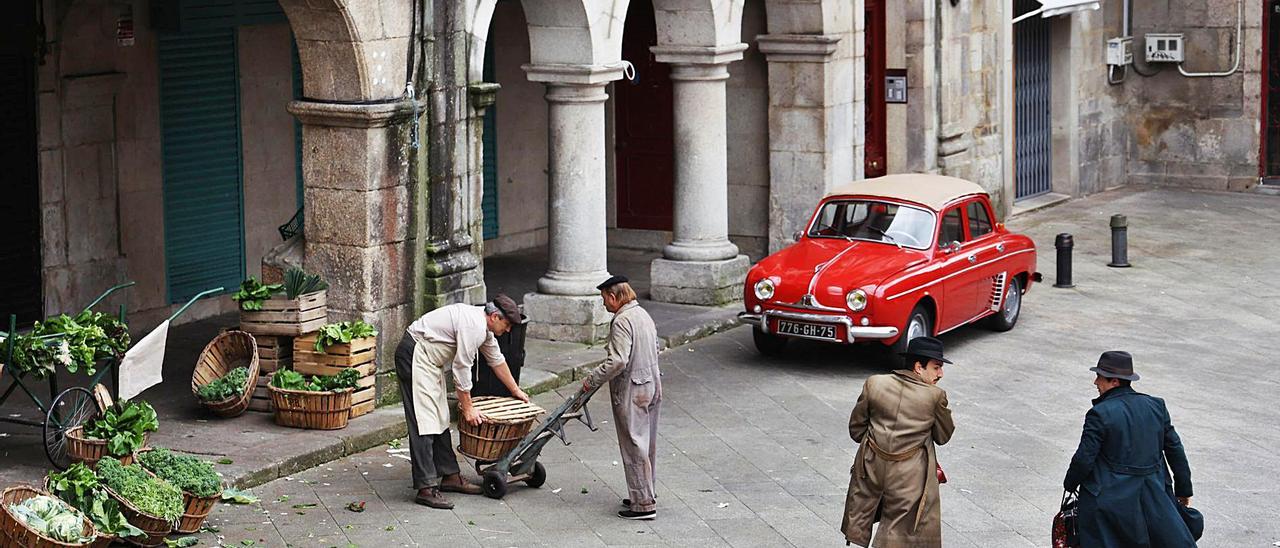 Arriba, un instante del rodaje 
de la película, tras abandonar 
el banco.   | // FOTOS: ALBA VILLAR