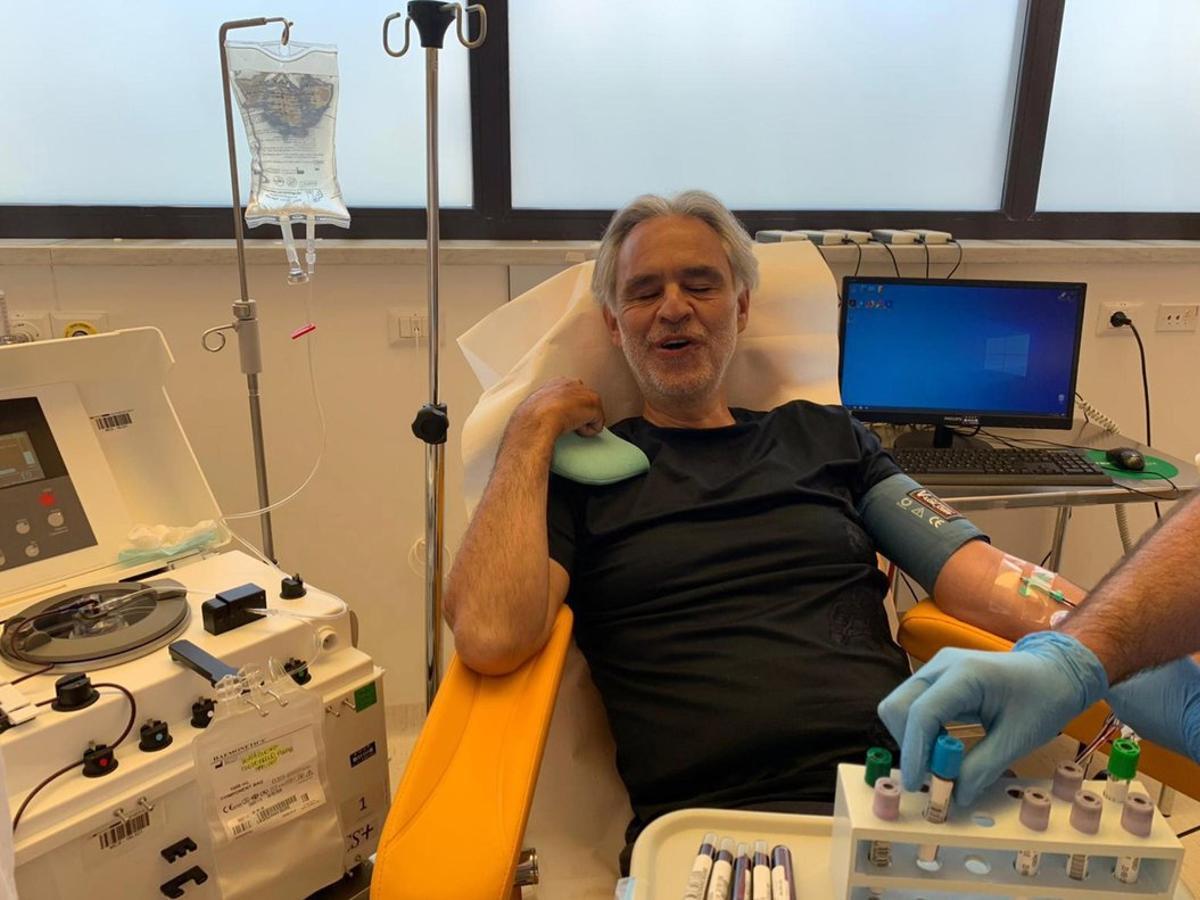 Pisa (Italy), 26/05/2020.- A handout photo made available by the AOUP (Azienda Ospedaliero-Universitaria Pisana) University hospital of Pisa Press Office shows Italian opera singer Andrea Bocelli donating blood plasma for study on the treatment of coronavirus disease (COVID-19) patients, at Cisanello Hospital in Pisa, central Italy, 26 May 2020. The artist was in fact among the positive cases of coronavirus as revealed by himself. He discovered it on 10 March 2020 after taking a test, media reported. Speaking to journalists outside of the hospital, Bocelli explained that he had no particular problems, a bit of fever, but in practice asymptomatic. (Italia) EFE/EPA/AOUP UNIVERSITY HOSPITAL PISA HANDOUT -- BEST QUALITY AVAILABLE -- HANDOUT EDITORIAL USE ONLY/NO SALES