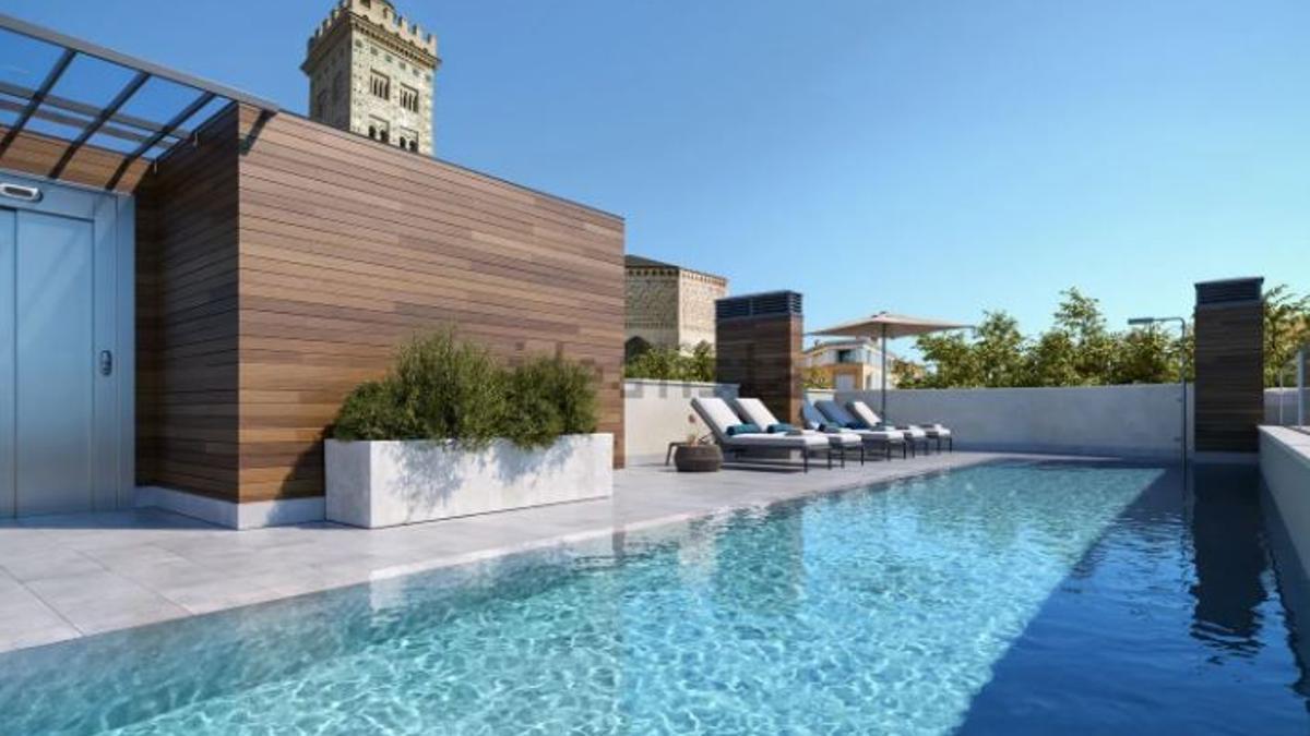 Piscina con vistas a la torre de La Magdalena en el edificio que se está construyendo.