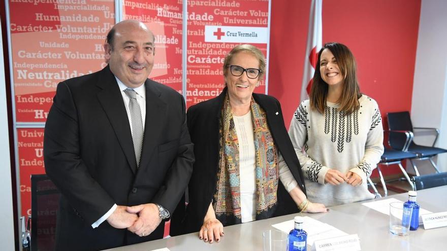 Representantes de Cruz Roja y DIA en la presentación del convenio