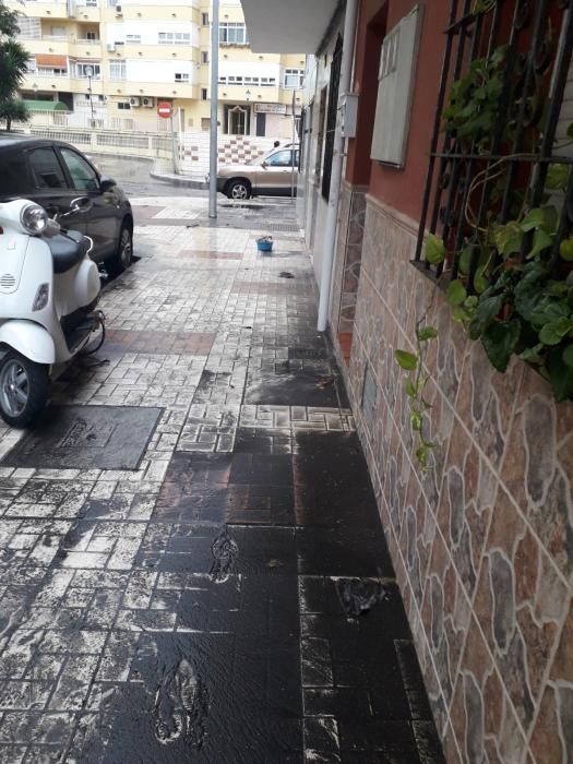 Los efectos de las fuertes lluvias en el barrio de Huelin