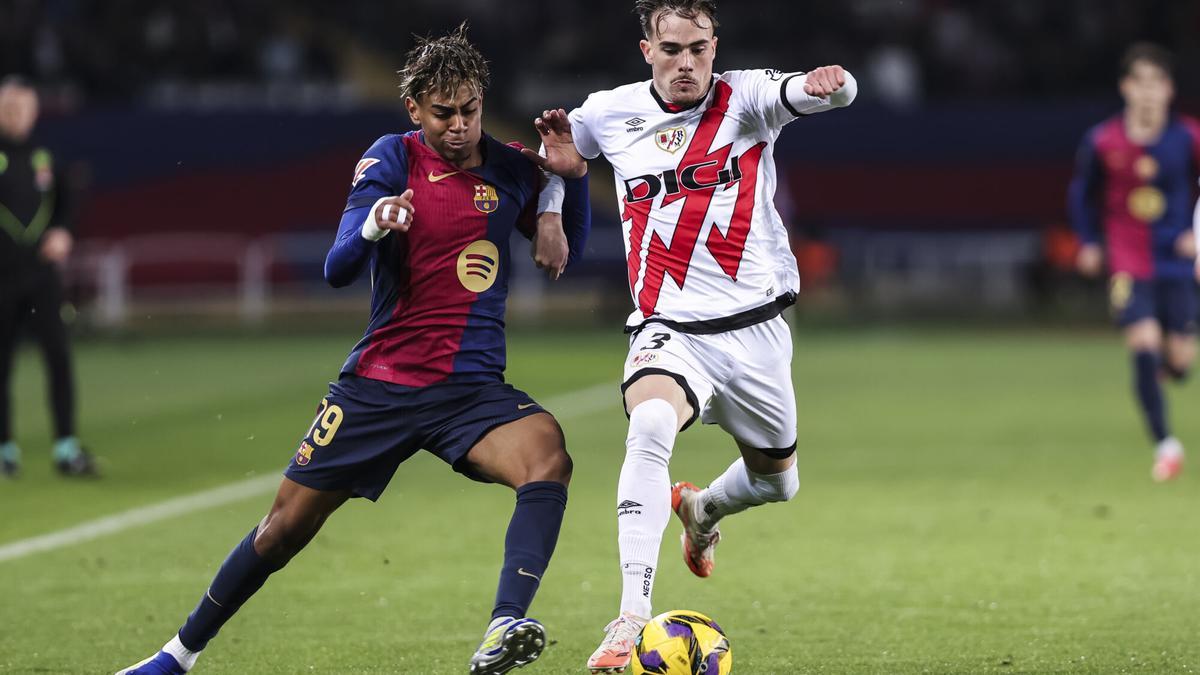 Lamine Yamal of FC Barcelona and Pep Chavarria of Rayo Vallecano compete for the ball during the Spanish league, La Liga EA Sports, football match played between FC Barcelona and Rayo Vallecano at Estadio Olimpico de Montjuic on February 17, 2025 in Barcelona, Spain. AFP7 17/02/2025 ONLY FOR USE IN SPAIN. Javier Borrego / AFP7 / Europa Press;2025;SPORT;ZSPORT;SOCCER;ZSOCCER;FC Barcelona v Rayo Vallecano - La Liga EA Sports;