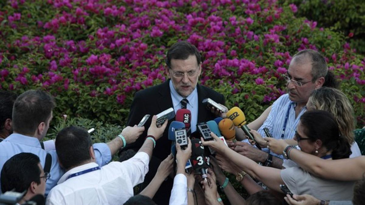 Mariano Rajoy atiende a los medios, anoche, en Los Cabos (México).