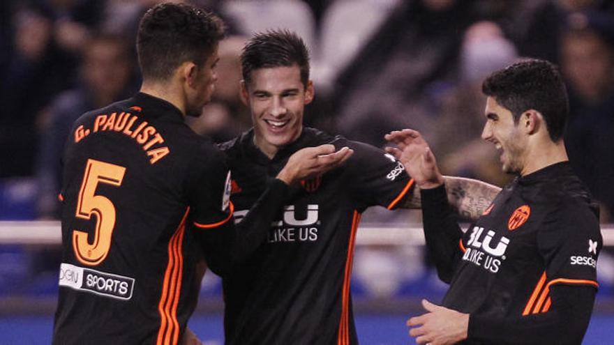 Paulista, Mina y Guedes celebran un gol en Riazor.