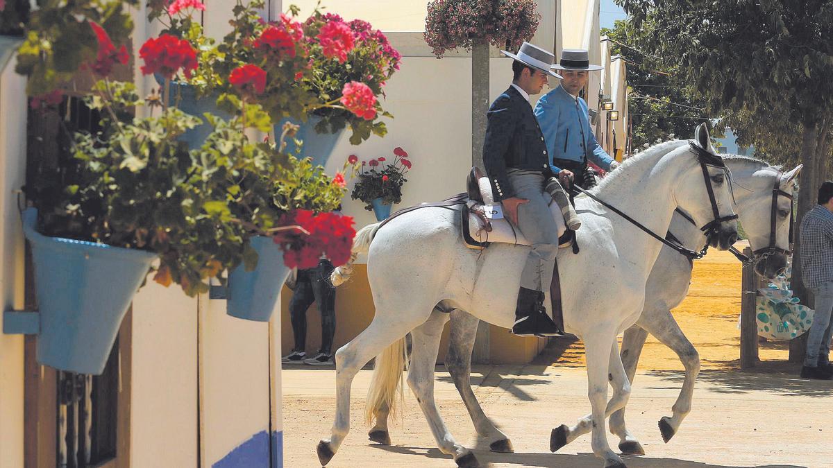 Caballistas en El Arenal.