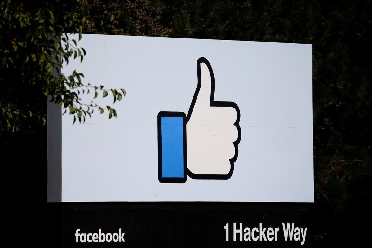 FILE PHOTO: The entrance sign to Facebook headquarters is seen in Menlo Park, California, on Wednesday, October 10, 2018. REUTERS/Elijah Nouvelage/File Photo