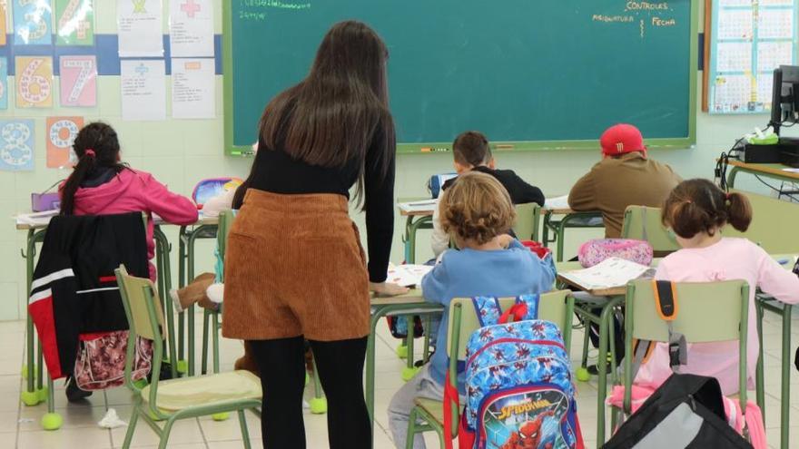 Alumnos en un colegio antes de la pandemia.