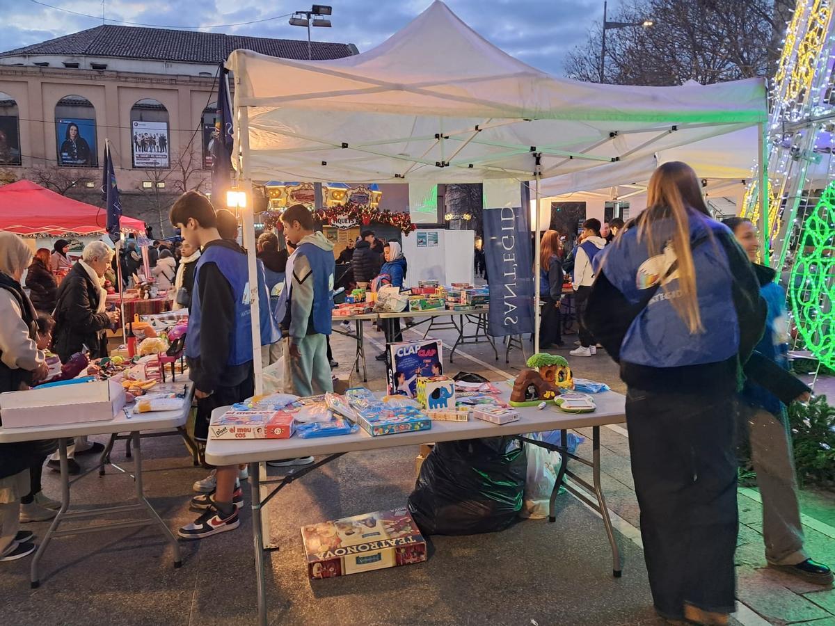 La parada que va muntar la comunitat de Sant Egidi a la plaça de Sant Domènec