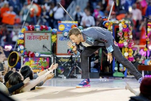 Chris Martin, lead singer of Coldplay, performs during the half-time show at the NFL's Super Bowl 50 between the Carolina Panthers and the Denver Broncos in Santa Clara