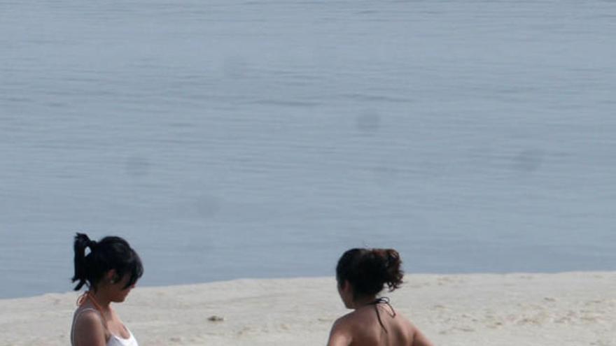 Playa de La Malagueta con las típicas natas.