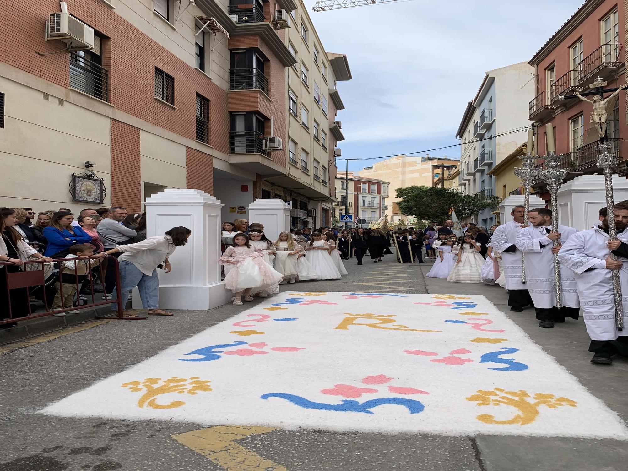 La procesión de la Virgen del Rocío por la Victoria y Lagunillas, en imágenes