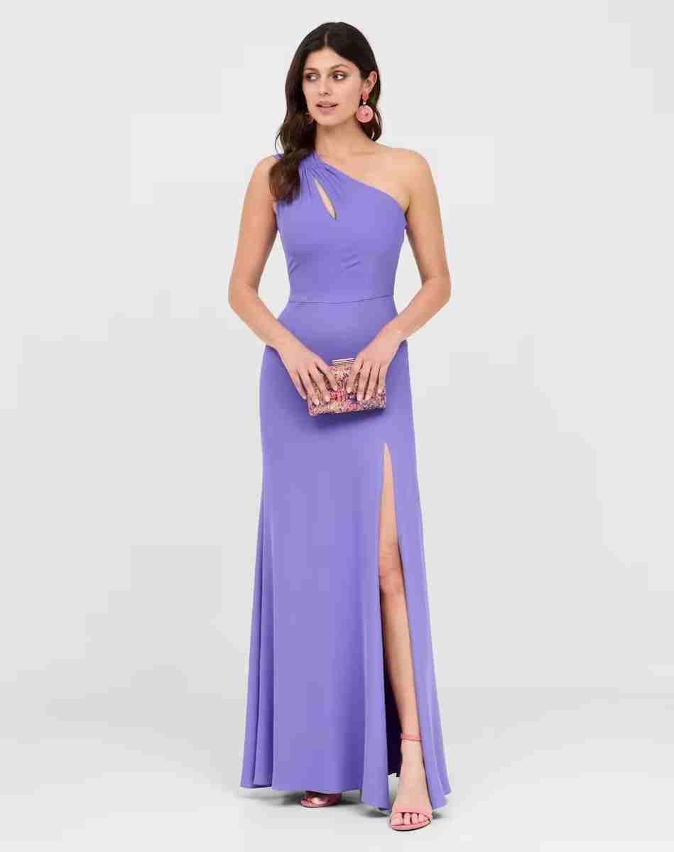 Vestido largo con escote asimétrico y abertura lateral de Veneno en la piel