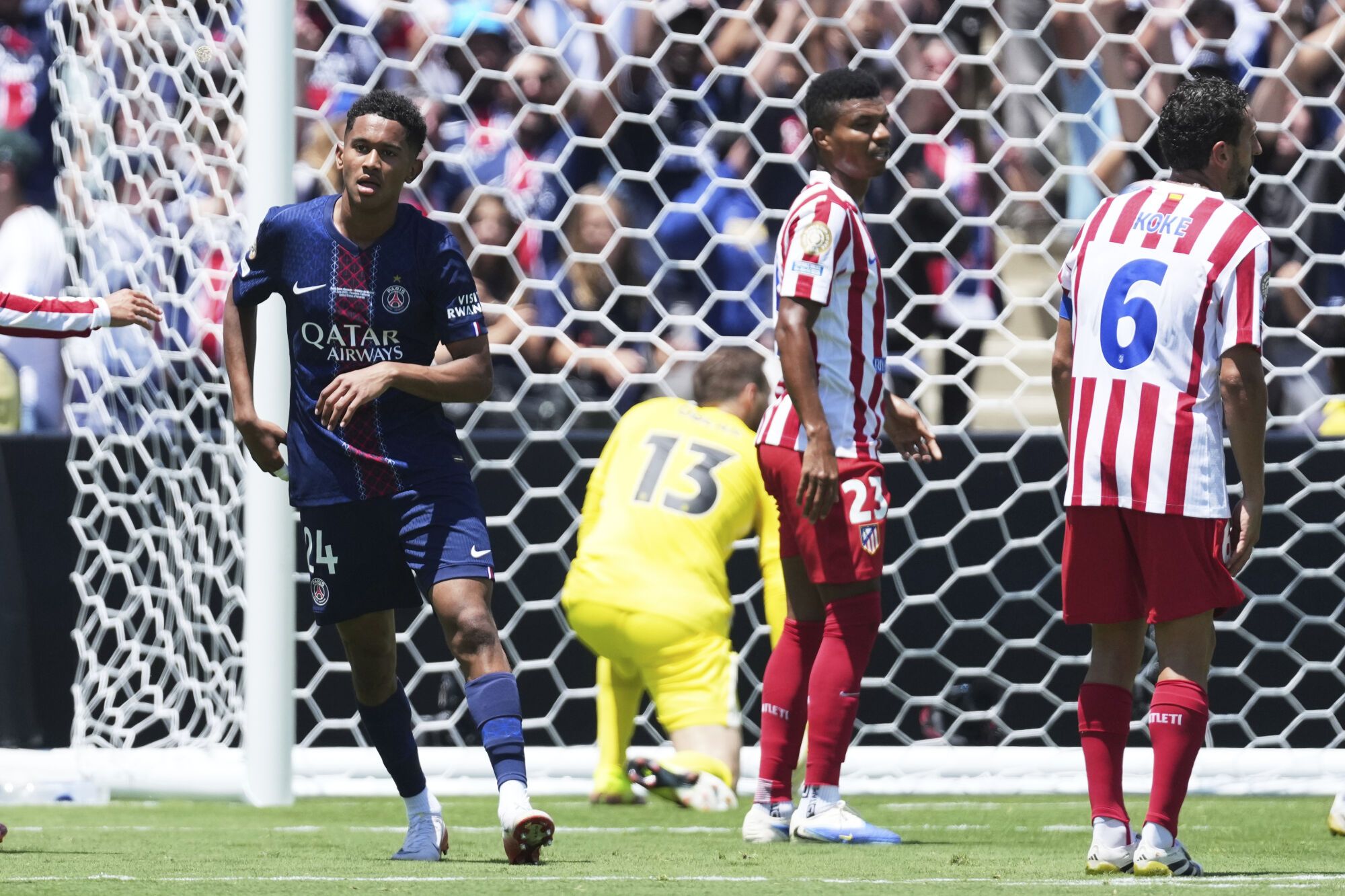 Paris Saint-Germain's Senny Mayulu (24) reacts after scoring his side's third goal during the Club World Cup group B soccer match between PSG and Atletico Madrid in Pasadena, Calif., Sunday, June 15, 2025. (AP Photo/Jae Hong)