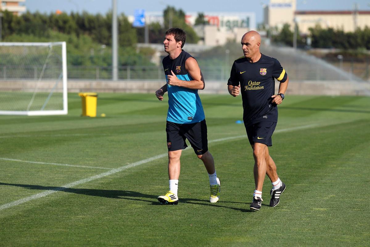 Leo Messi junto al preparador físico Juanjo Brau en un entrenamiento en la Ciutat Esportiva en 2012