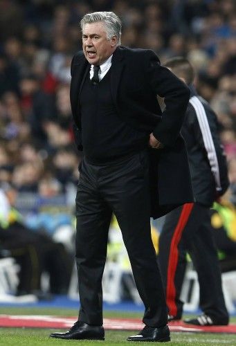 Real Madrid's coach Ancelotti shouts during their Spanish First Division soccer match against Celta Vigo at Santiago Bernabeu stadium in Madrid