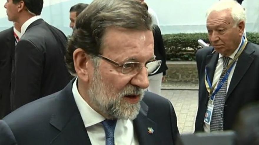 Rajoy dice que los cambios en el Gobierno y el PP serán este mes