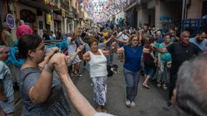 "Aquí hi ha caliu de barri", presumeixen els veïns de Sants