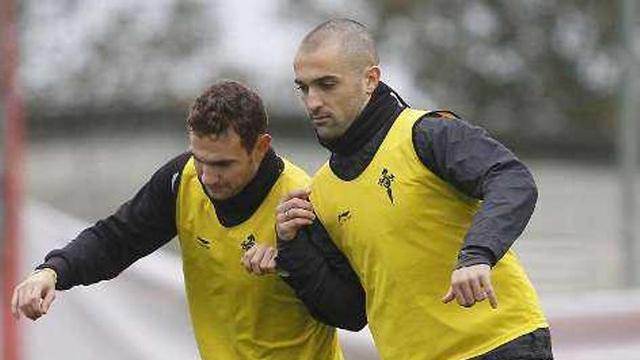 Bustos y Rodríguez, en un entrenamiento.  // Grobas