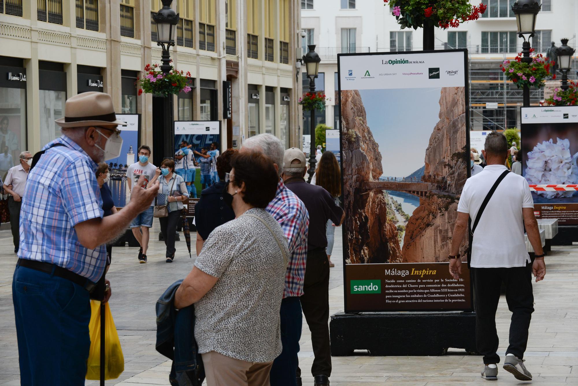 Exposición fotográfica 'Málaga Inspira', en la calle Larios