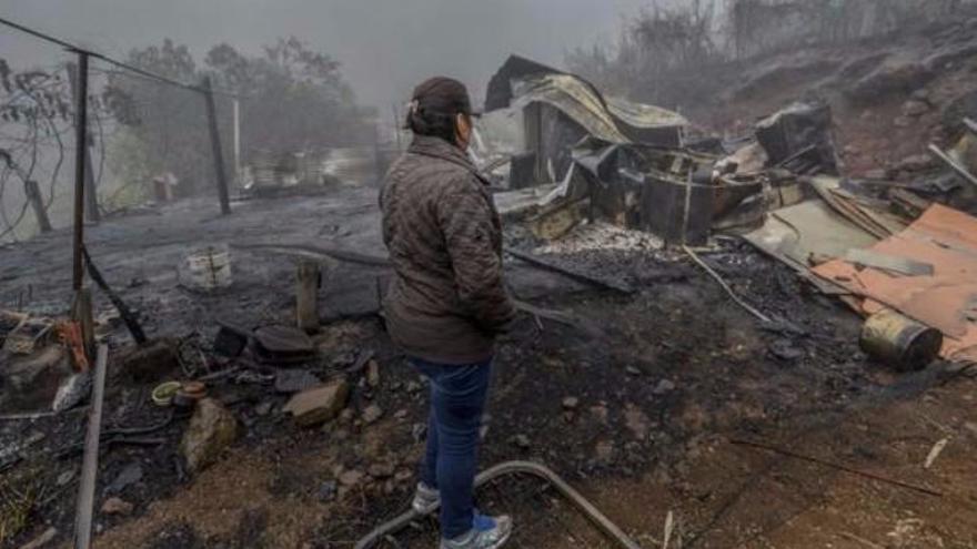 Una de las viviendas afectadas por el fuego.