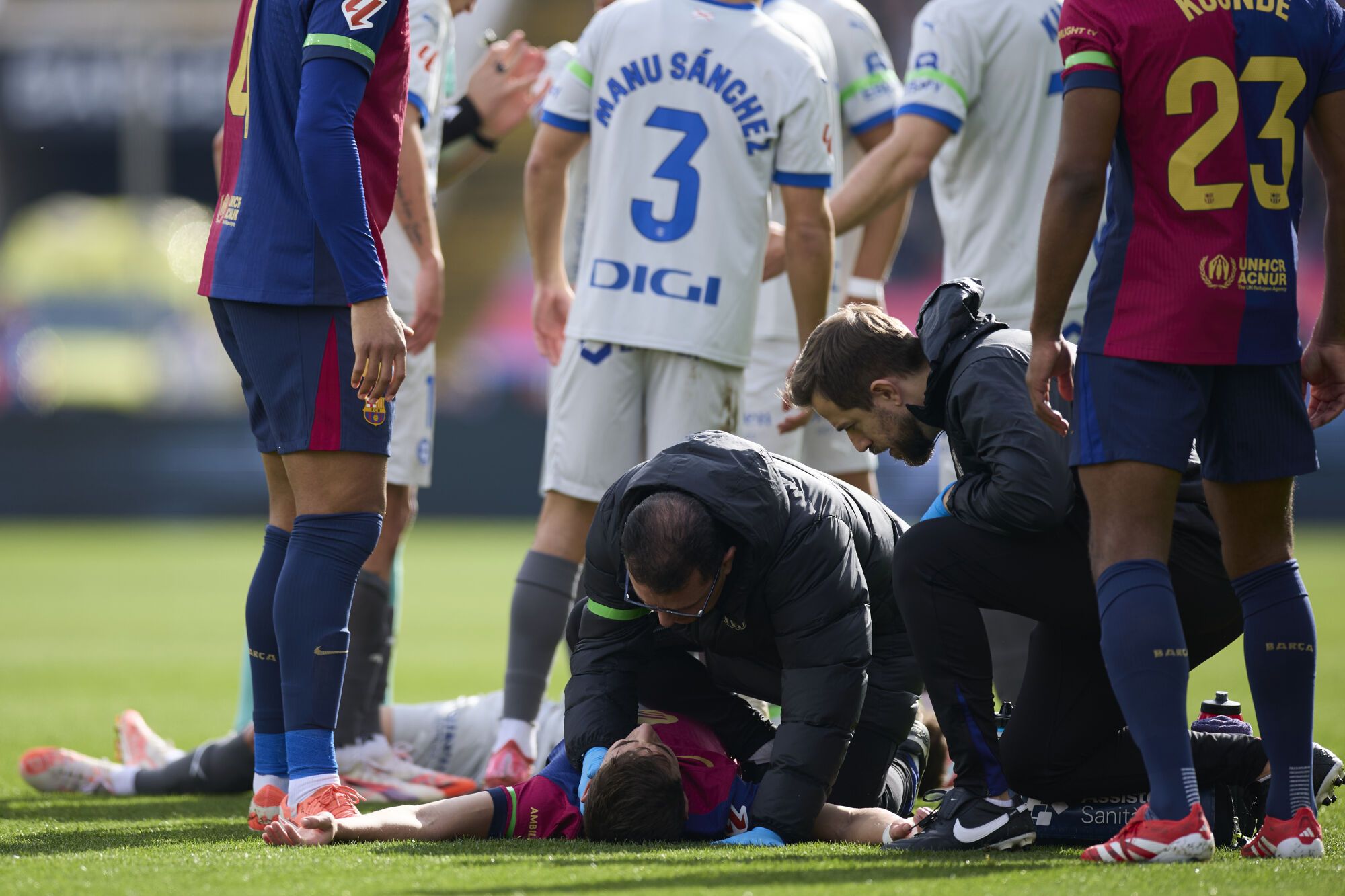 Pablo Martin Paez Gavira 'Gavi' of FC Barcelona its helped by medical services during the LaLiga EA Sports match between FC Barcelona and Deportivo Alaves at Estadi Olimpic Lluis Companys on February 2, 2025, in Barcelona, Spain. AFP7 02/02/2025 ONLY FOR USE IN SPAIN. Ricardo Larreina / AFP7 / Europa Press;2025;SPORT;ZSPORT;SOCCER;ZSOCCER;FC Barcelona v Deportivo Alaves - La Liga EA Sports;
