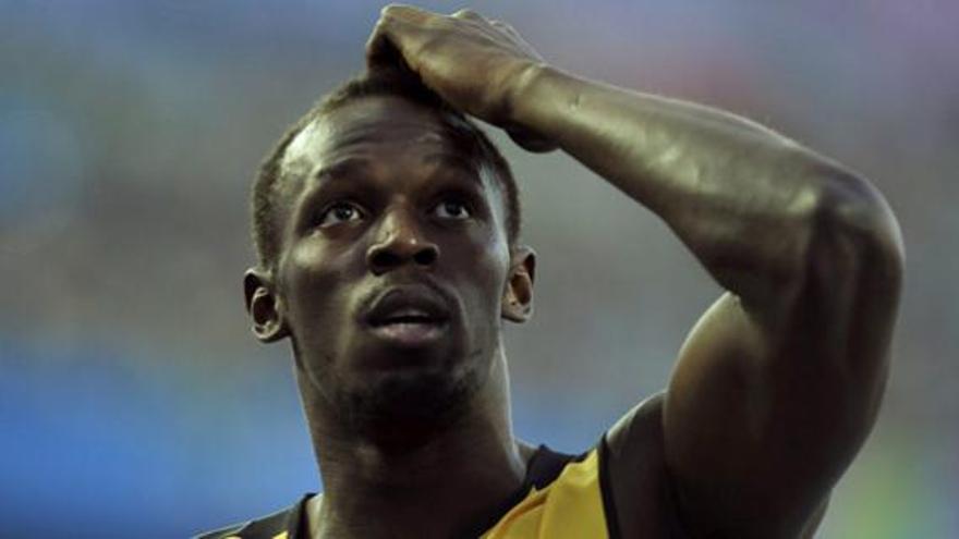 Bolt, descalificado, cede la corona de los 100 metros a Blake